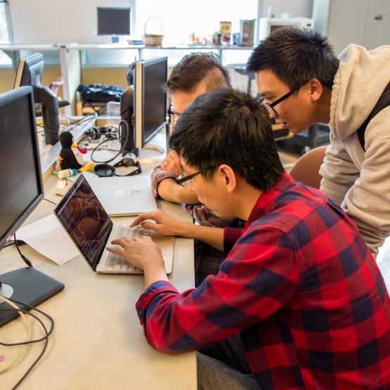 Students working on laptop